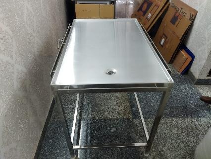 EXAMINATION TABLE